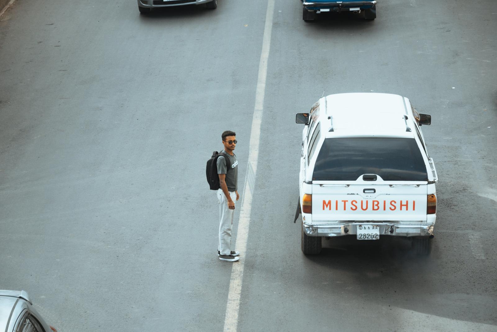 A Man Crossing Street