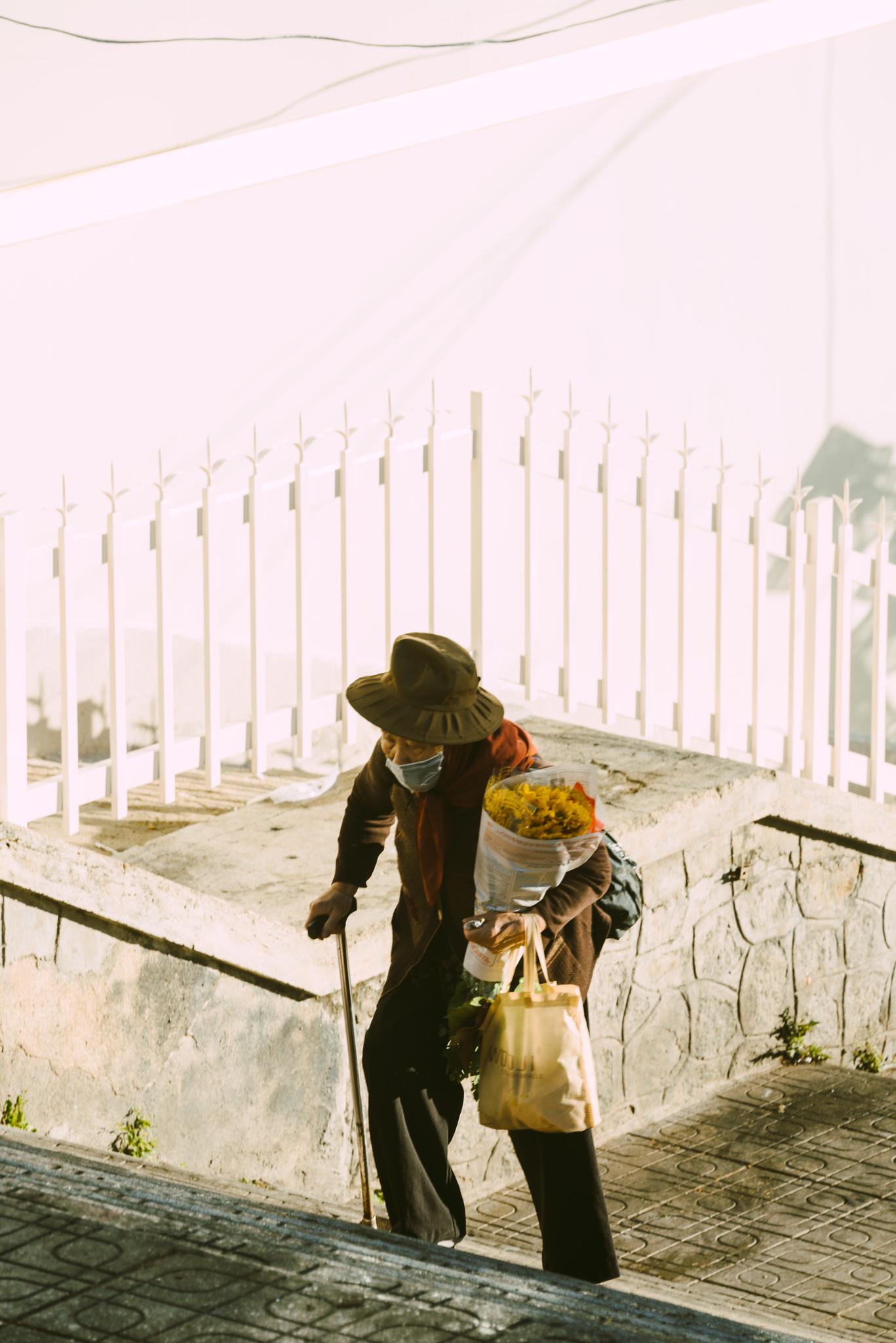 An Elder Woman and Her Bouquet