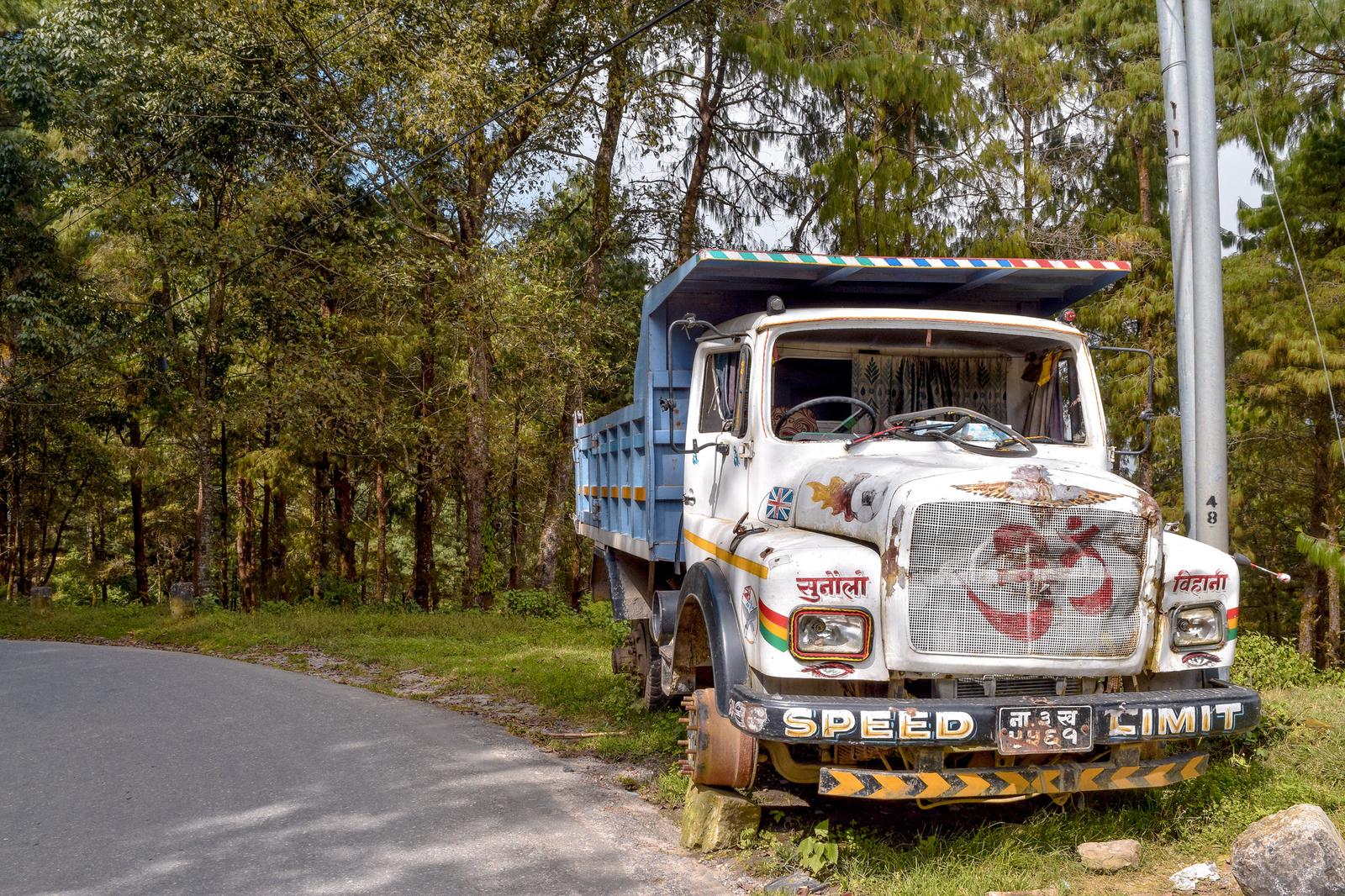 Twisting Roads, Horse and Dump Truck